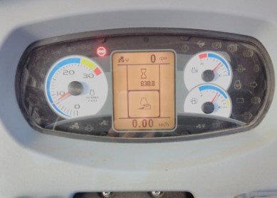 What do the Case 450 Skid Steer Warning Lights and Symbols indicate